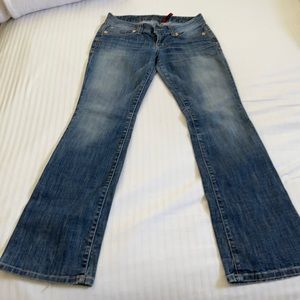 Super cute Guess Jeans size 28 has some wear on bottom and side belt loop